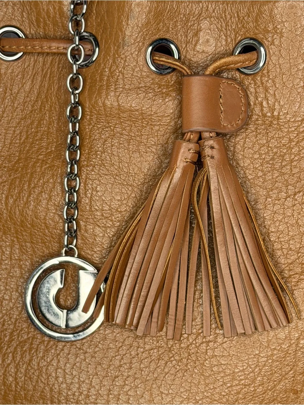 Stylish Tan Leather Satchel with Tassel Charm